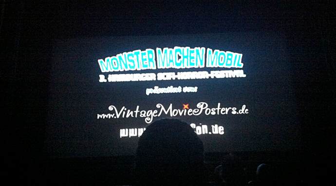 Kinoleinwand mit dem Titel von Monster machen mobil